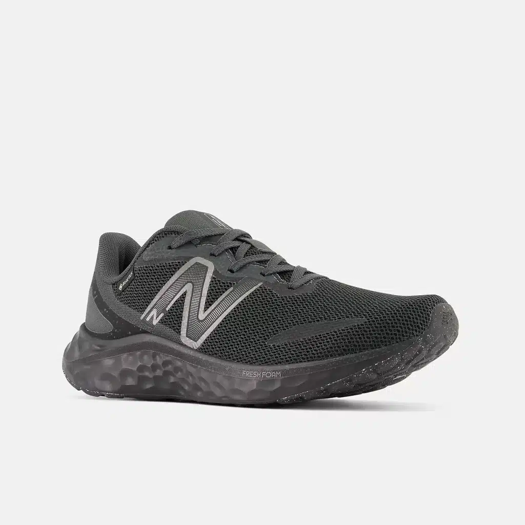 A side view of a grey New Balance Fresh Foam Arishi V trainer