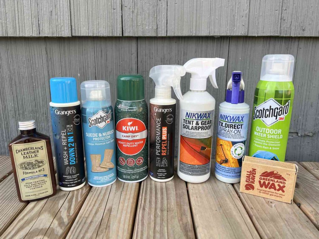 A view of best sneaker waterproofing sprays placed on a wooden bench