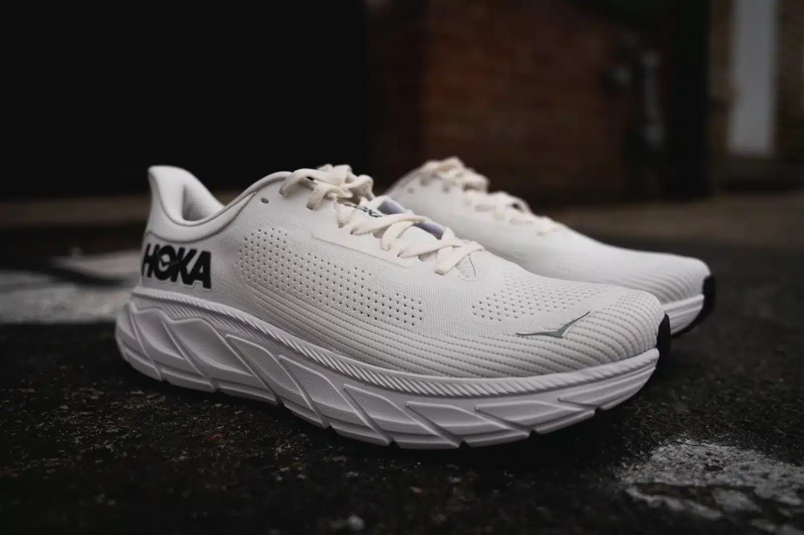 A view of white Hoka Arahi Running Stability Sneakers jpg