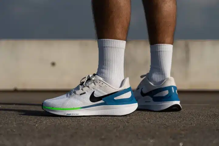 a man wearing Nike Air Zoom Structure